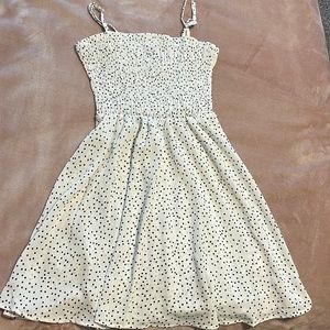 A woman’s polka dot dress